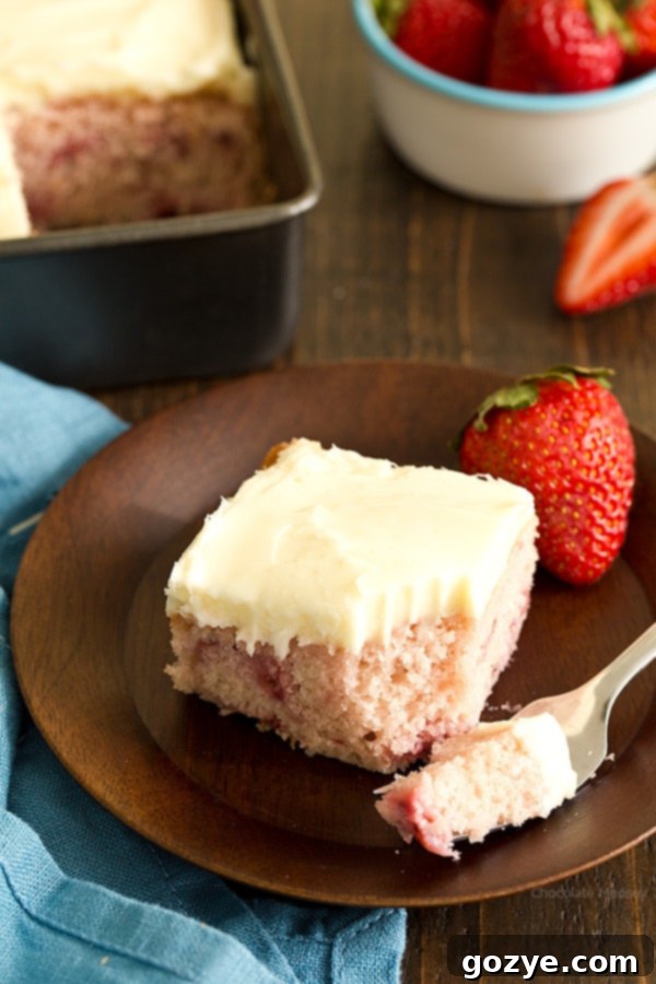 Close up of a slice of homemade Strawberry Snacking Cake on a plate