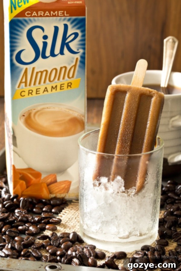 Creamy Caramel Latte Pops 4 Pouring caramel latte mixture into popsicle molds