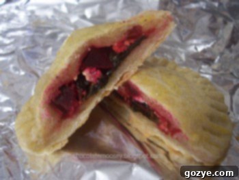 Delicious Swiss Chard, Beet, and Goat Cheese Empanadas ready to be served.