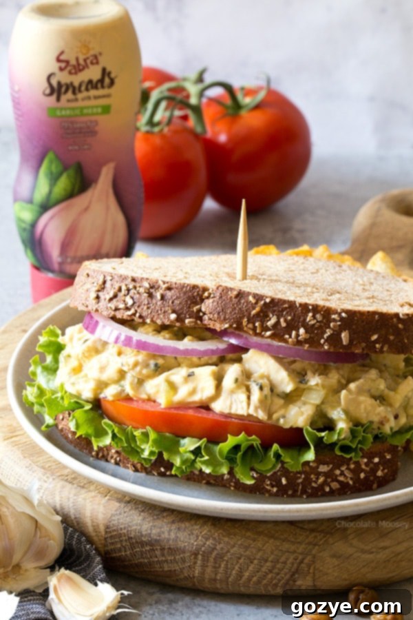 Garlic Hummus Chicken Salad Sandwiches with a creamy garlic hummus spread - pack them for lunch or have them ready for dinner when you won't have time to cook.