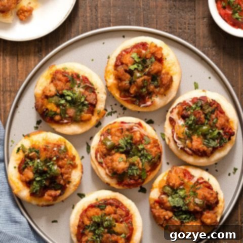 Finished Italian Sausage Pizza Bites in a muffin pan, ready to be served