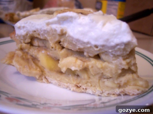 Pastry cream being spread over bananas