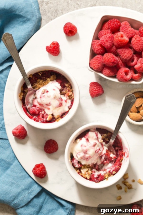 Raspberry Crisp Duet 2 Enjoy a sweet ending to your day with mini Raspberry Almond Crisp For Two with a sweet and slightly tart raspberry filling topped with a crispy almond streusel baked in two ramekins.