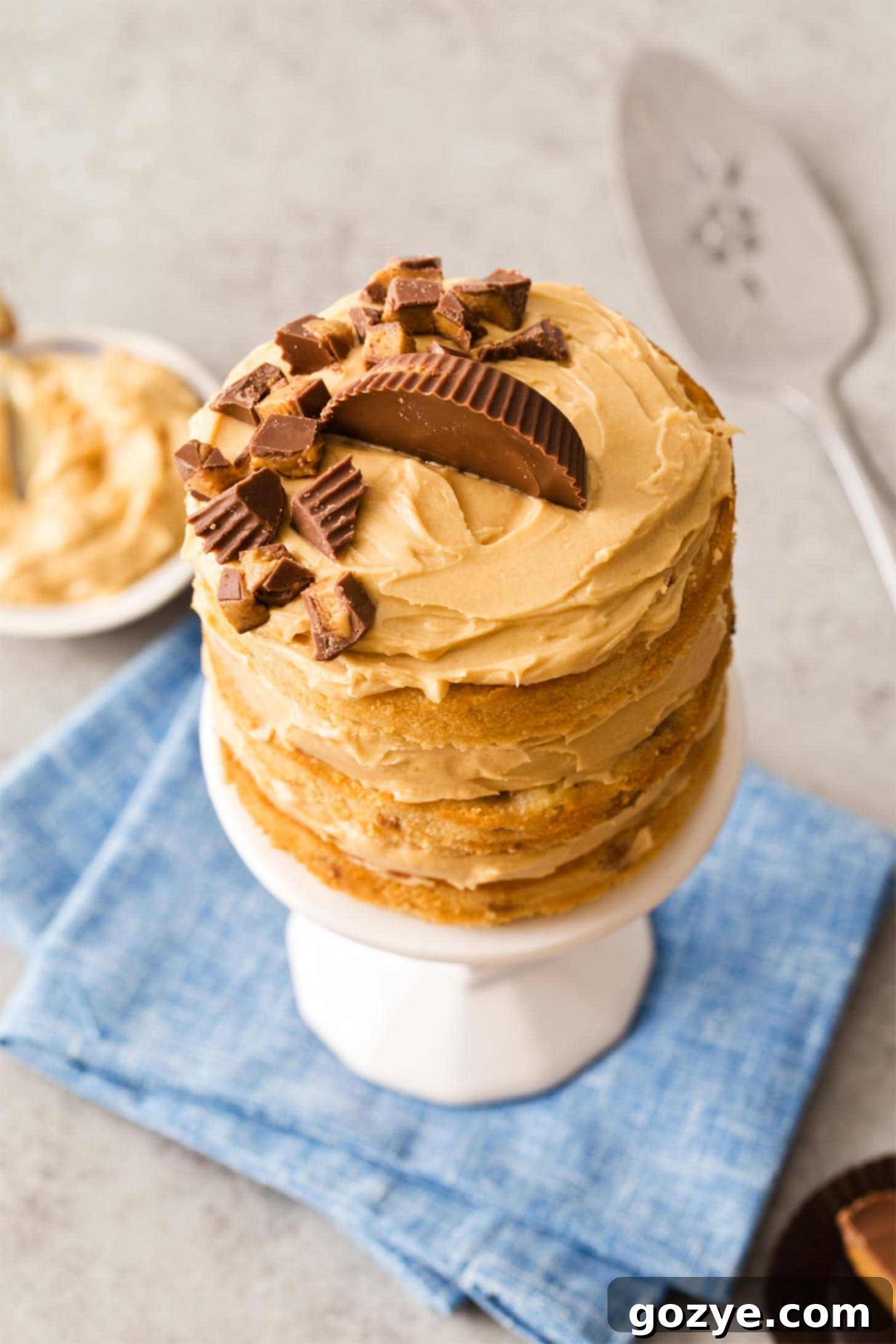 Peanut Butter 4 Inch Cake Recipe, a stacked mini cake on a white stand
