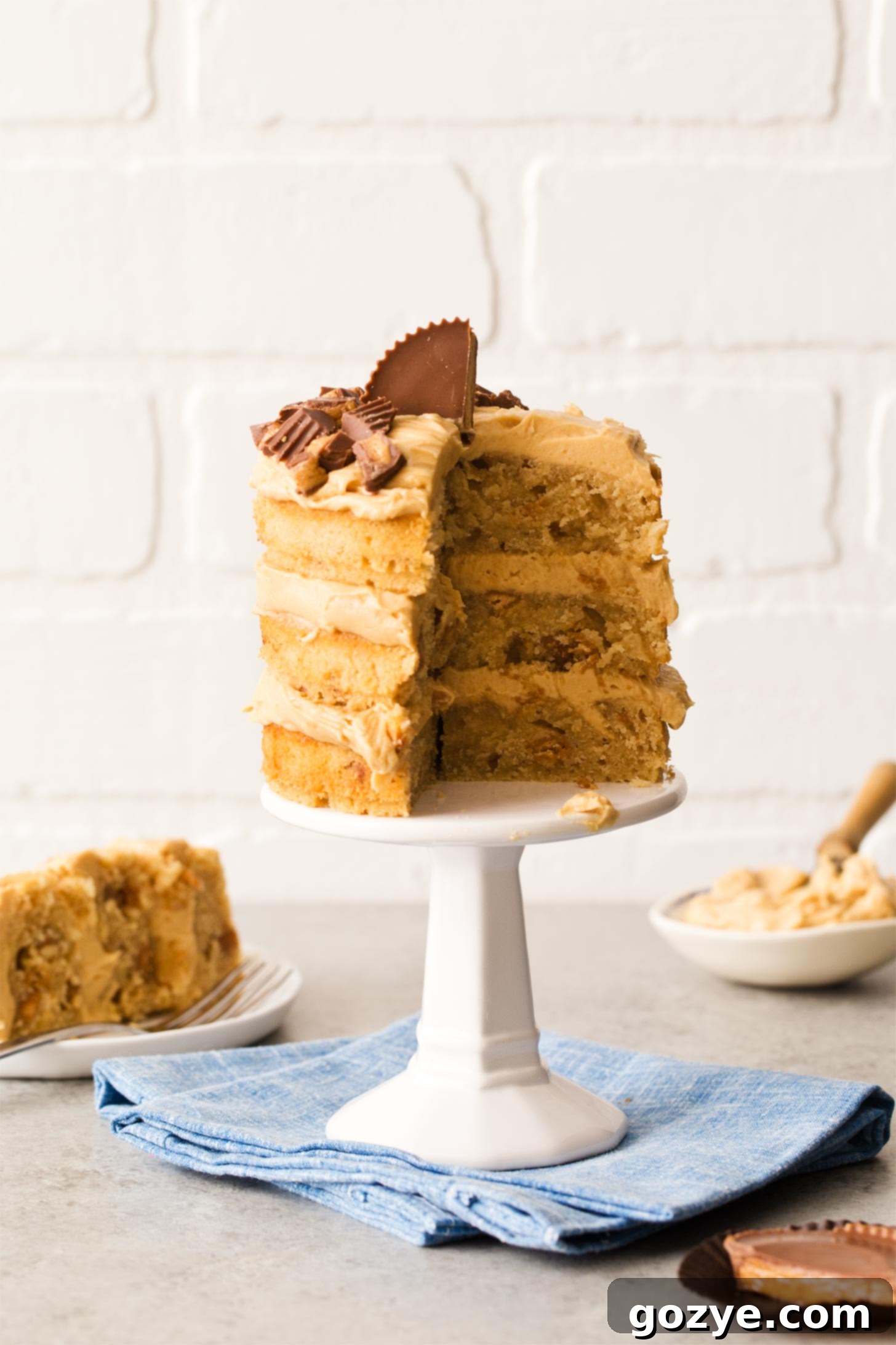 Peanut Butter Cake recipe with a slice served from it, showing the inside