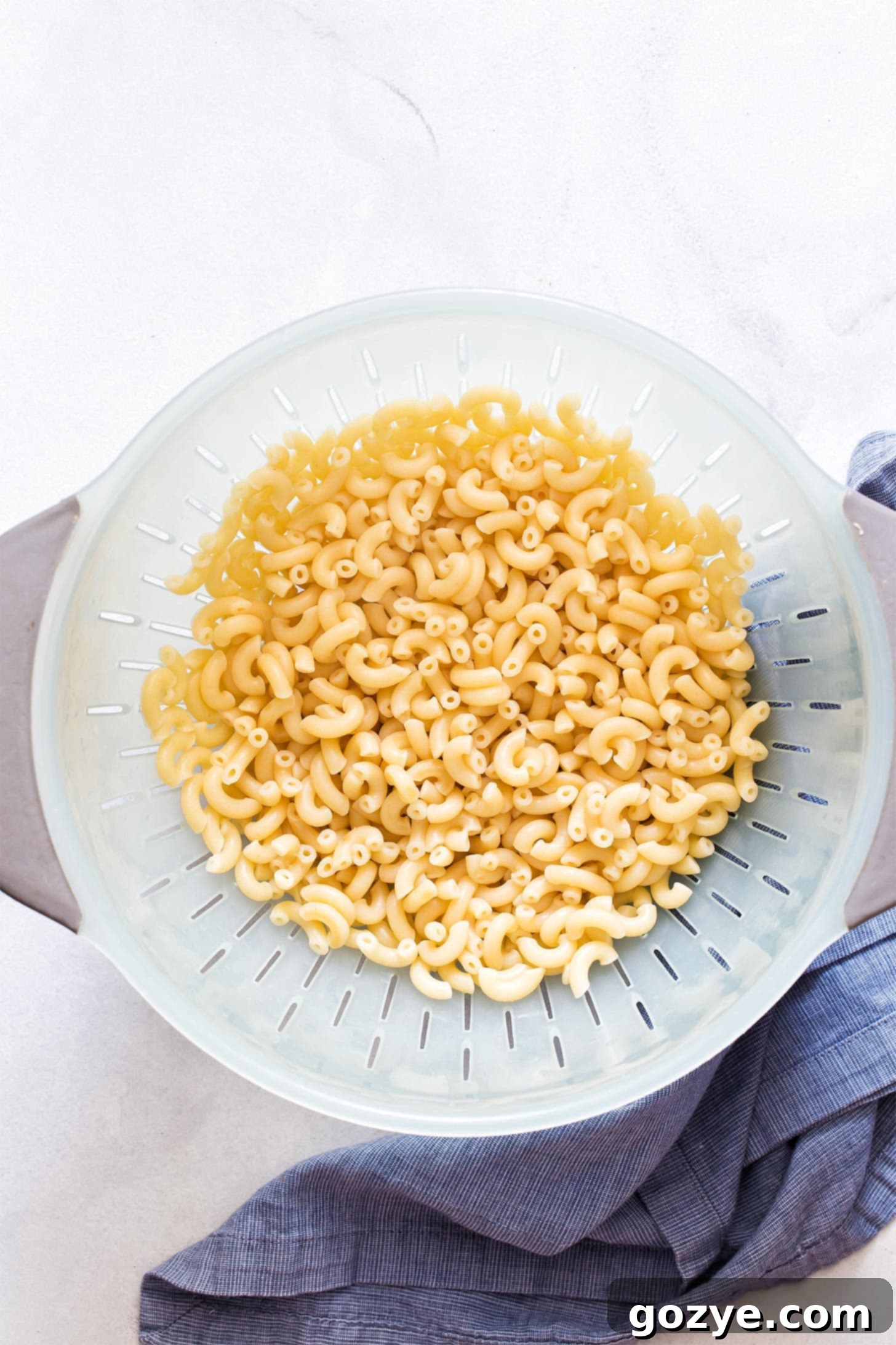 Amish Farmhouse Macaroni Salad 5 Cooked macaroni in colander for Amish Macaroni Salad