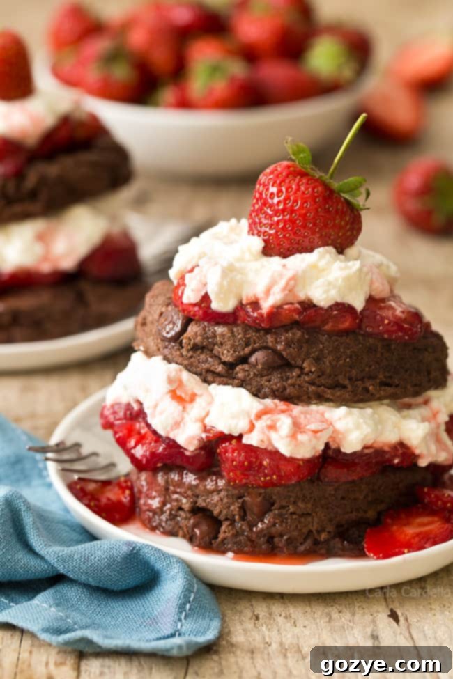 Chocolate Strawberry Shortcake on white plate with fork