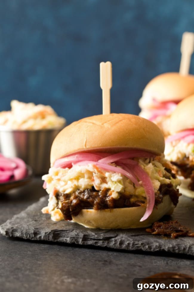 Pinterest logo with Slow Cooker Shredded Beef Sliders image