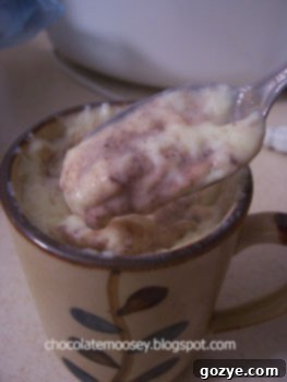 A close-up shot of the Split-Level Pudding's smooth and creamy texture, inviting a taste.