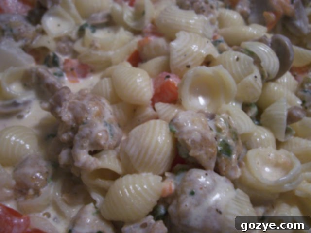 Delicious Creamy Chicken Sausage Pasta with Spinach and Feta