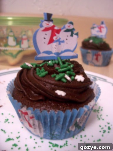 Mystery Chocolate Cupcakes 2 Close-up of a frosted Chocolate Surprise Cupcake with sprinkles