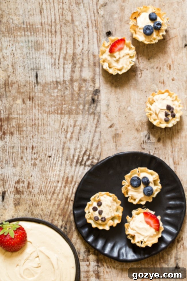 Peanut Butter Fruit Dip made with marshmallow creme and Greek yogurt served in phyllo cups