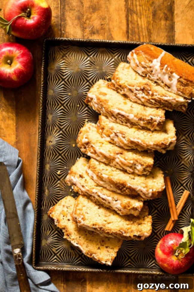 Homemade Cinnamon Apple Bread on a cooling rack.