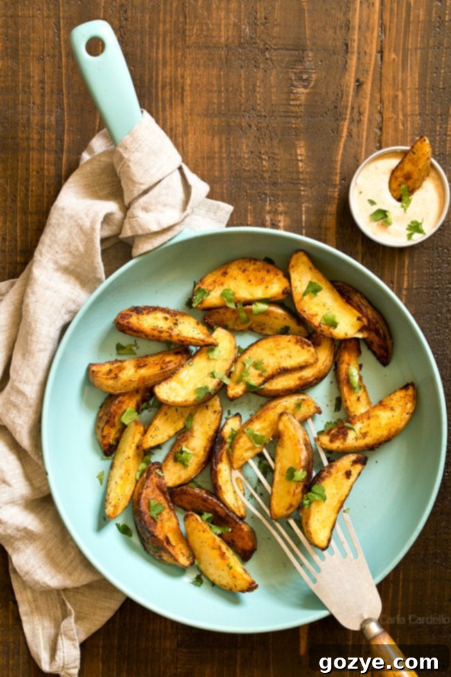 Blue skillet with pan fried potatoes