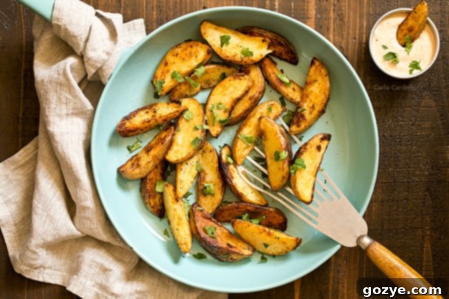 Blue skillet with pan seared potatoes