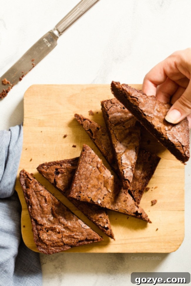 Hand holding small batch brownie