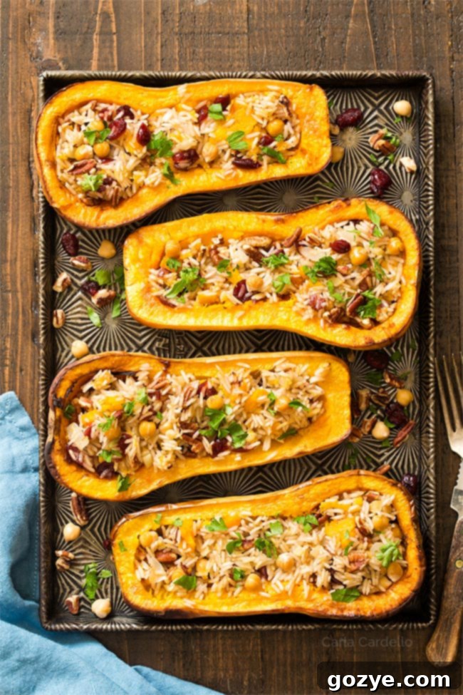 Vegan Stuffed Butternut Squash, a hearty vegetarian Thanksgiving main.