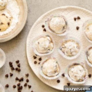 Perfectly round Chocolate Chip Snowball Cookies on a white plate, ready to be enjoyed