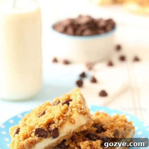 Small Batch Chocolate Chip Cookie Dough Cheesecake Bars, beautifully styled on a plate, featuring the delicious layers and ready to be savored.