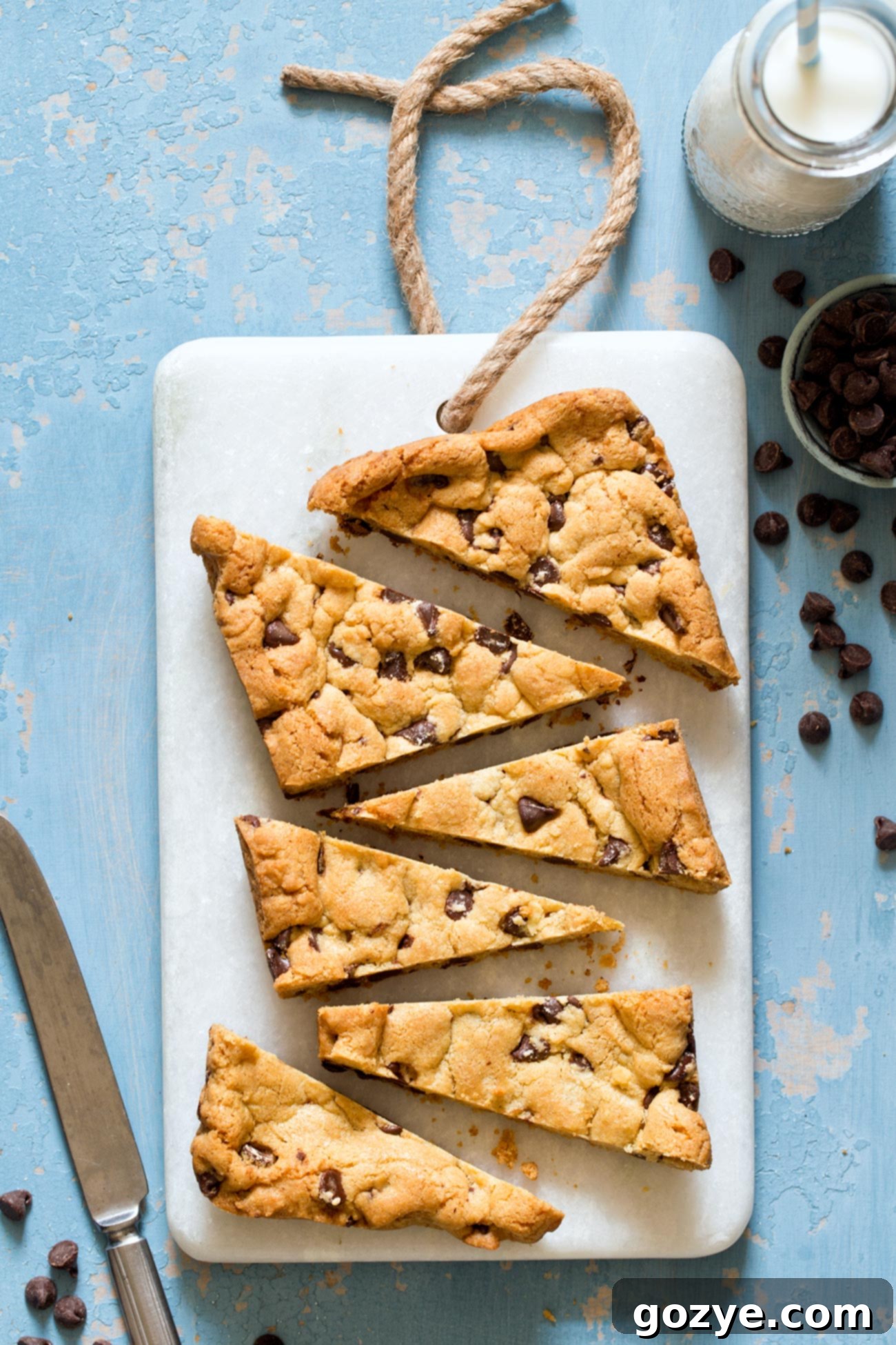 Effortless Small Batch Chocolate Chip Cookie Bars 4 Small Batch Chocolate Chip Cookies cut into bars, showing a slight dip in the middle