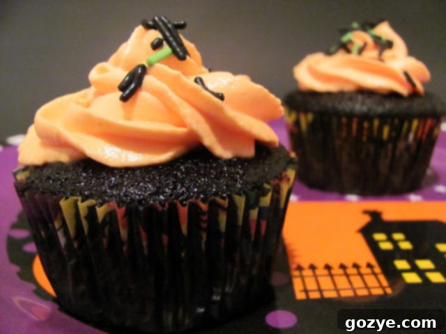 Close-up of Black Velvet Cupcakes with orange frosting