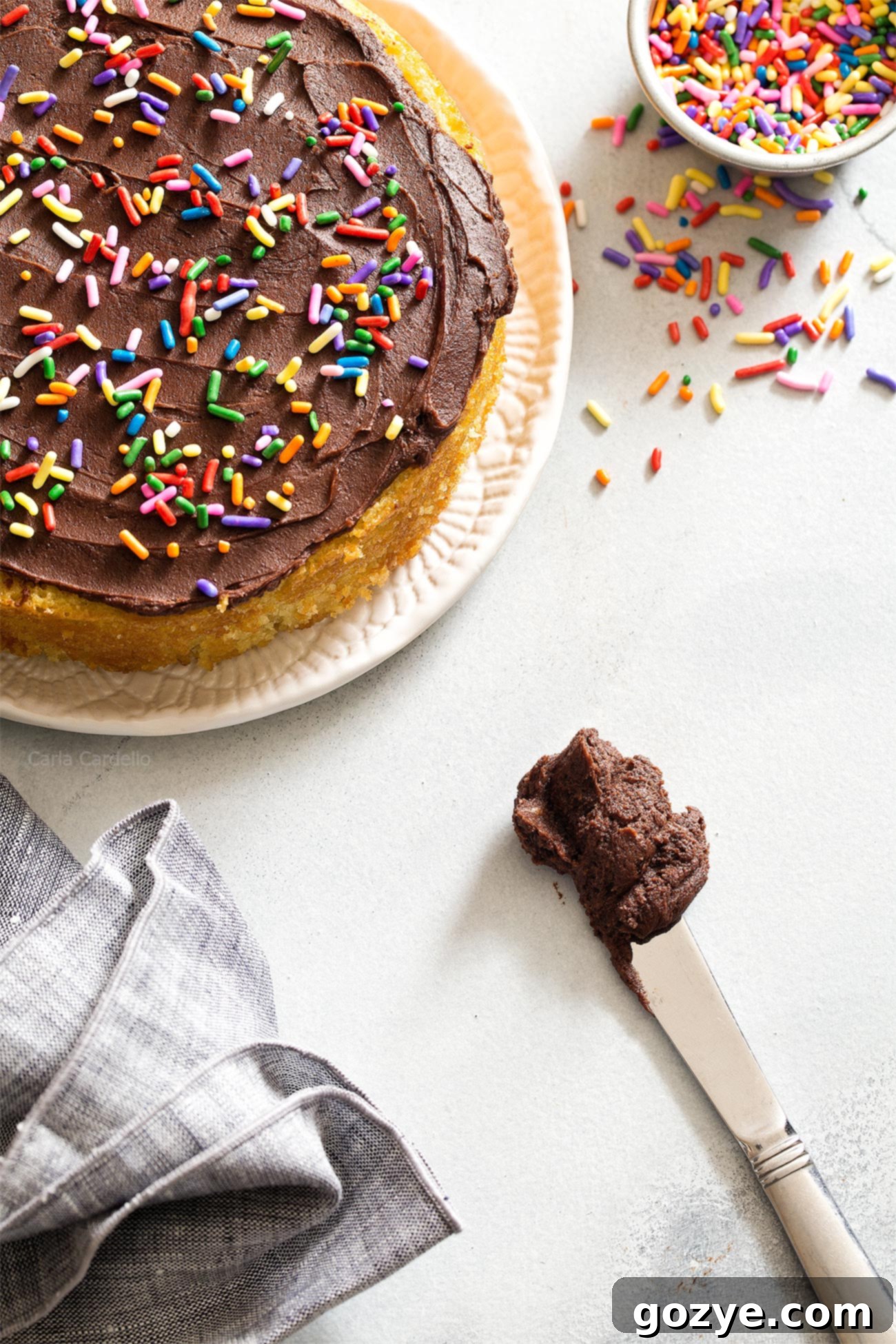 A beautifully frosted 6-inch yellow cake with decadent Small Batch Chocolate Frosting