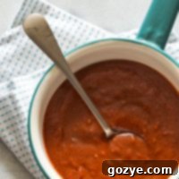 Small batch Homemade Red Enchilada Sauce recipe card image, perfect for easy enchiladas