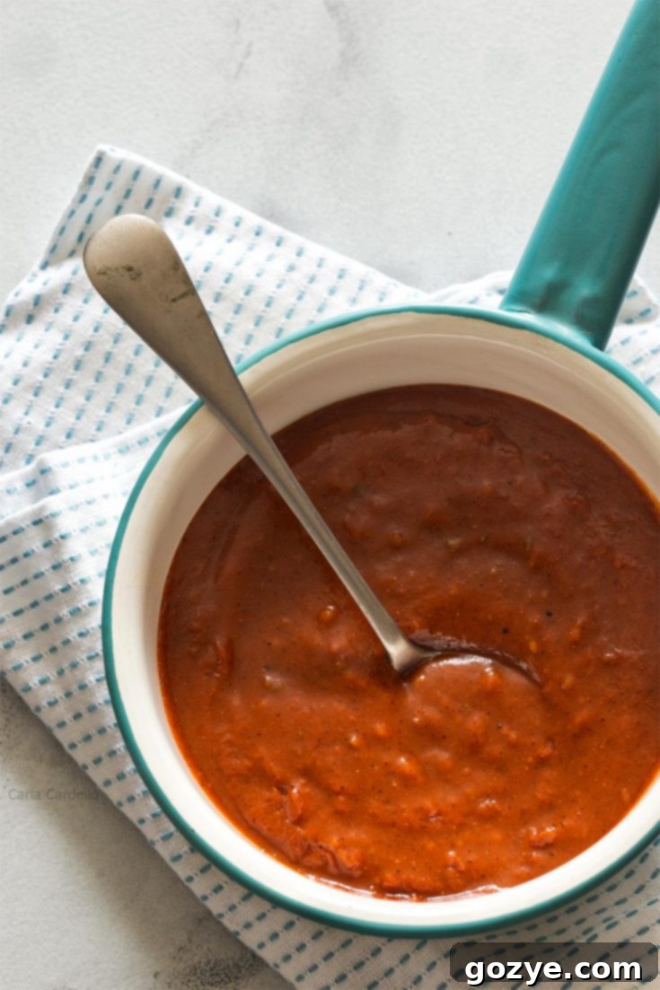 Homemade Red Enchilada Sauce ready to be served over enchiladas