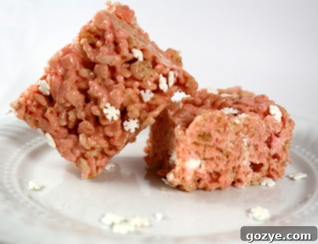 Cool Peppermint Crunch Bars 4 Peppermint Rice Crispy Treats topped with snowflake sprinkles