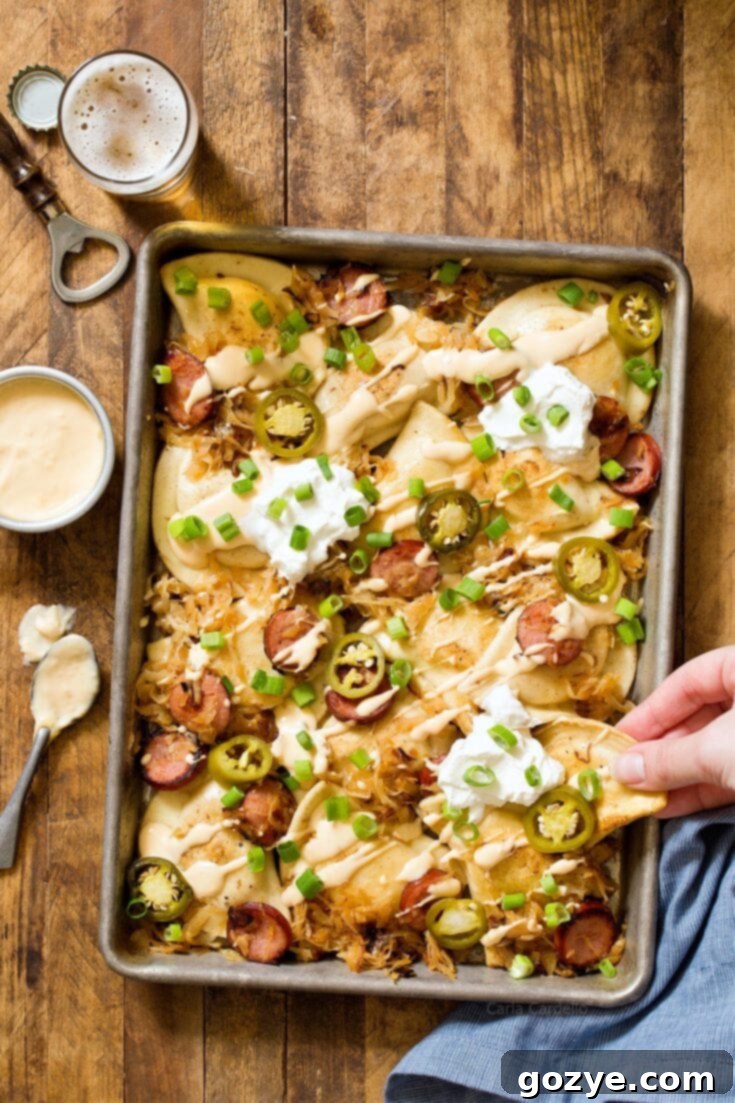 Pittsburgh Pierogy Nachos with beer cheese and kielbasa