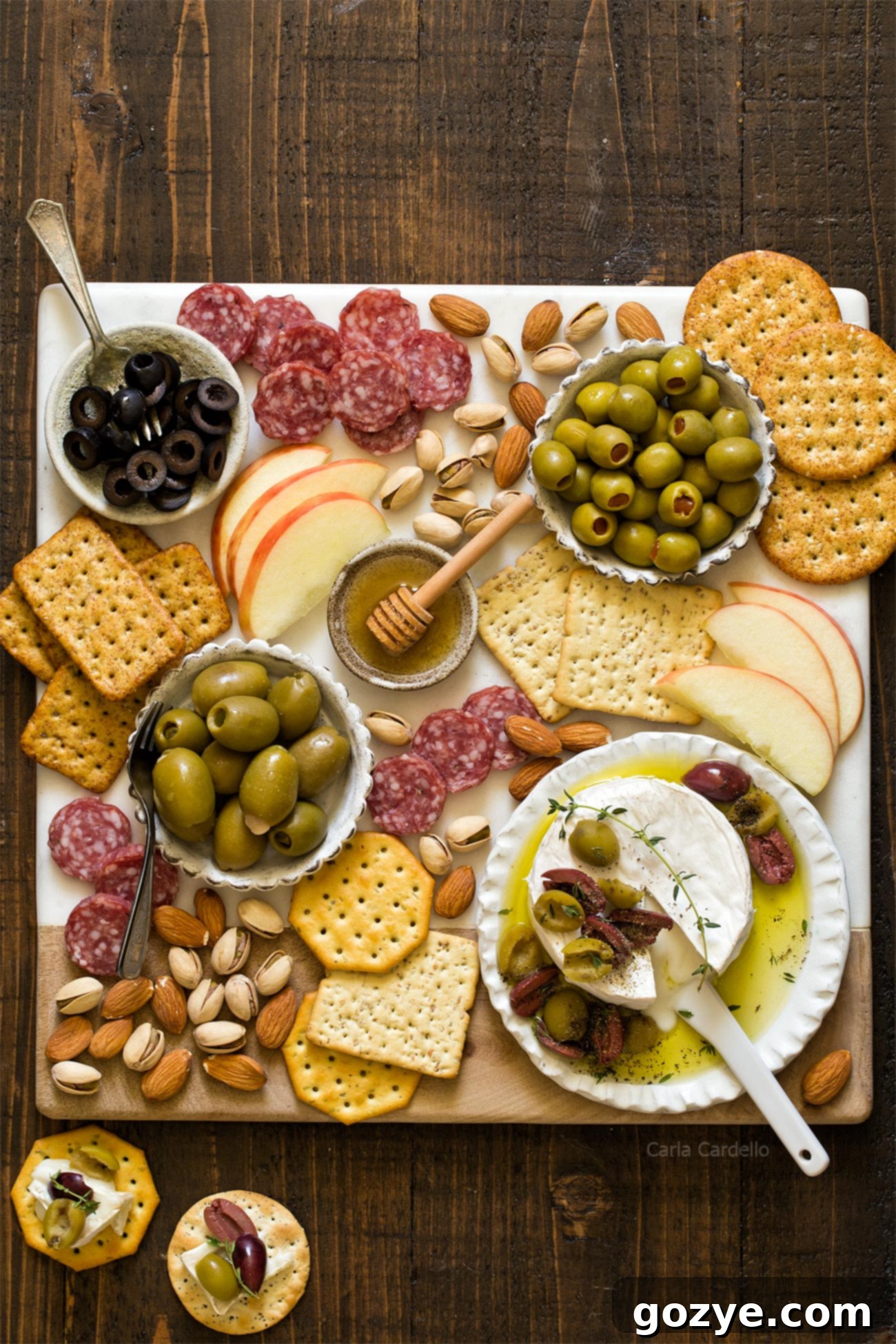 Melty Olive & Brie Delight 3 Olive Baked Brie for National Olive Day - a vibrant platter