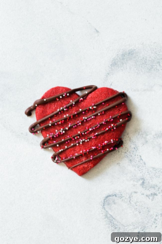 Crimson Velvet Delights 2 One Red Velvet Sugar Cookie with chocolate drizzle