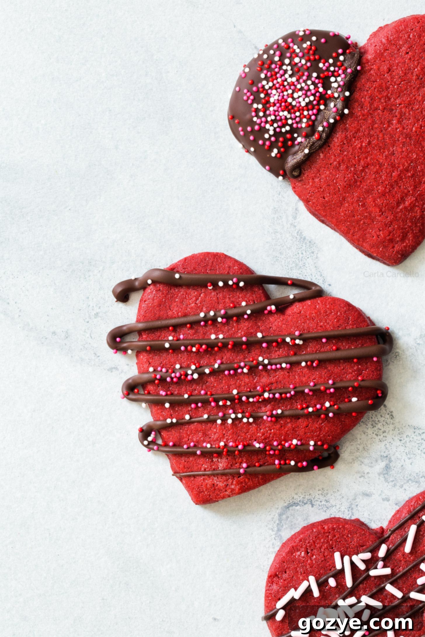 Crimson Velvet Delights 6 Three red velvet sugar cookies with icing
