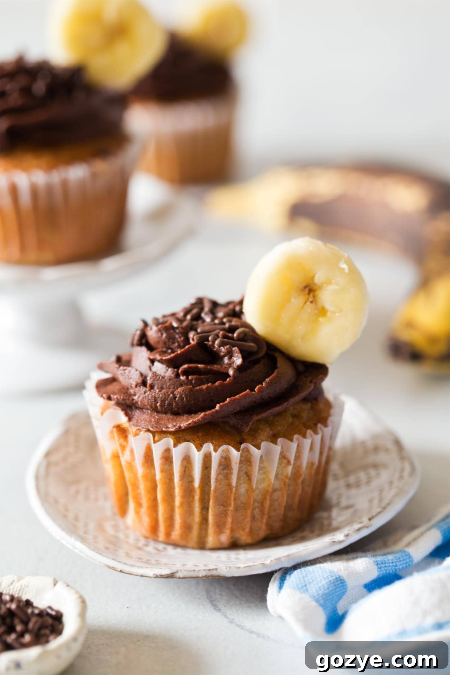 Banana Cupcake on white plate with banana