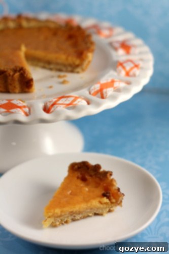 Close-up of a Blood Orange Tartlette, showing its deep red filling