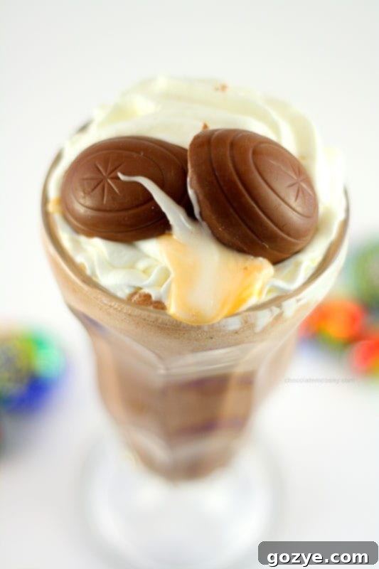 Your favorite Cadbury creme egg dessert in milkshake form! Chocolate ice cream and homemade fondant cream blended together for a sinful Cadbury Creme Egg Milkshake, just in time for Easter.