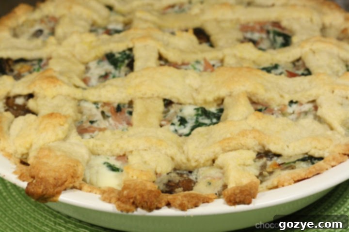 Pizza Rustica for Tuesdays With Dorie 3 Pizza Rustica before baking, showing the lattice top crust and colorful filling peeking through.