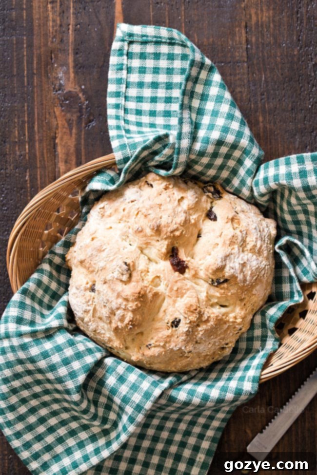 Irish Soda Bread Bites 4 Small Soda Bread in bread basket with green linen