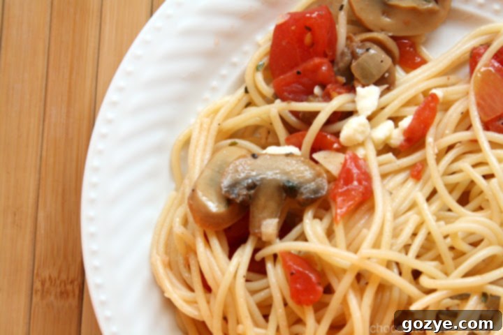 Easy Olive Oil Pasta 4 Ingredients for olive oil pasta laid out on a kitchen counter