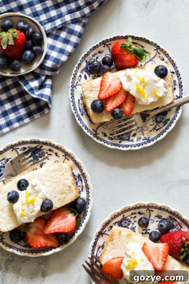 Angel Food Cake In A Loaf Pan with strawberries, blueberries, and whipped cream, a delightful dessert