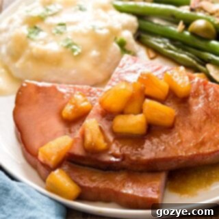 Easy Honey Glazed Ham Steak 7 Honey Glazed Ham Steak dinner on white plate