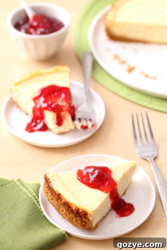 Date Night Cheesecakes 12 Classic Cheesecake recipe served with strawberry jam, a beautiful larger cheesecake