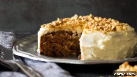 Super moist 6-inch Small Carrot Cake recipe for two with pineapple, coconut, walnuts, raisins, and cream cheese frosting