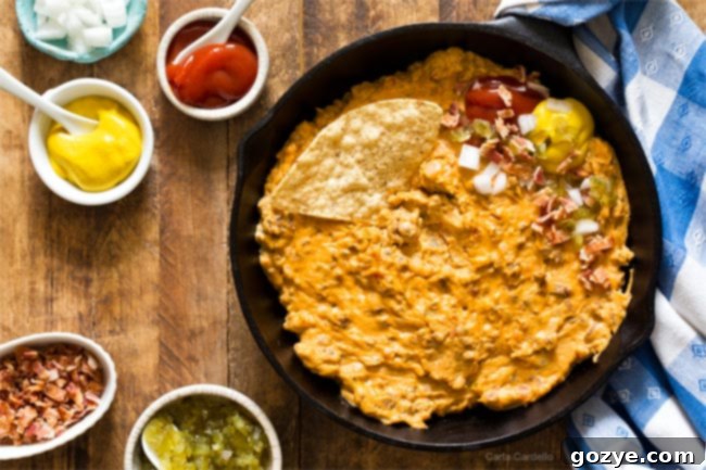 Cooking bacon in a skillet for Bacon Cheeseburger Dip