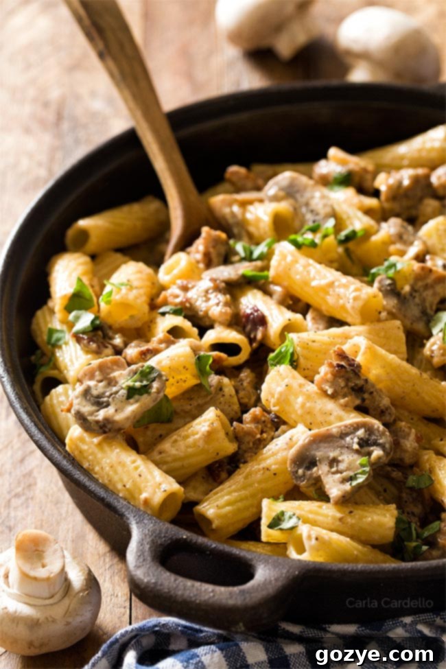 Close up of mushroom sausage pasta
