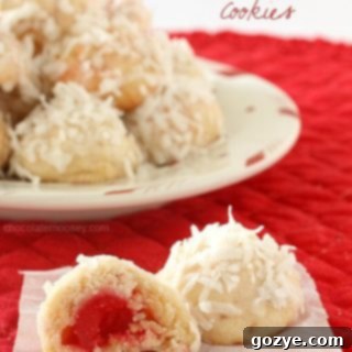 Cherry Coconut Snowball Cookies with a maraschino cherry center