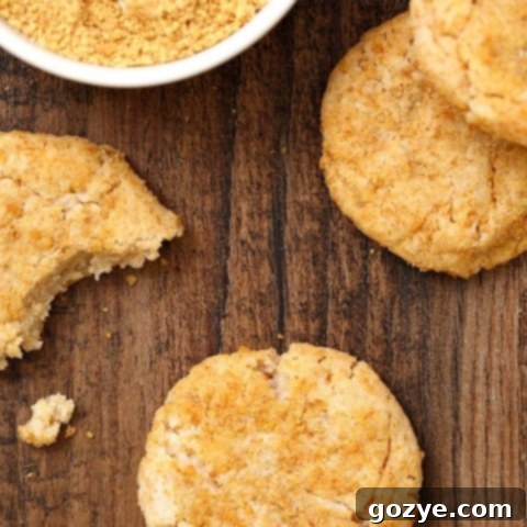 Small Batch Eggless Cheesecake Cookies rolled in graham cracker crumbs
