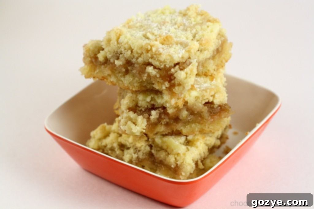 Golden Hungarian Shortbread bars with a hint of red jam peeking through