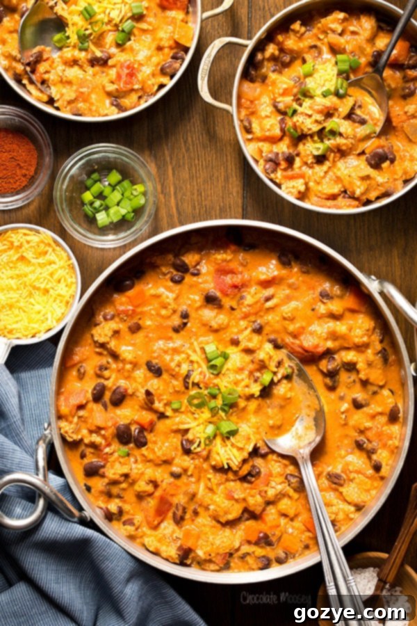 Buffalo Chicken Chili with ground chicken, black beans, and hot sauce