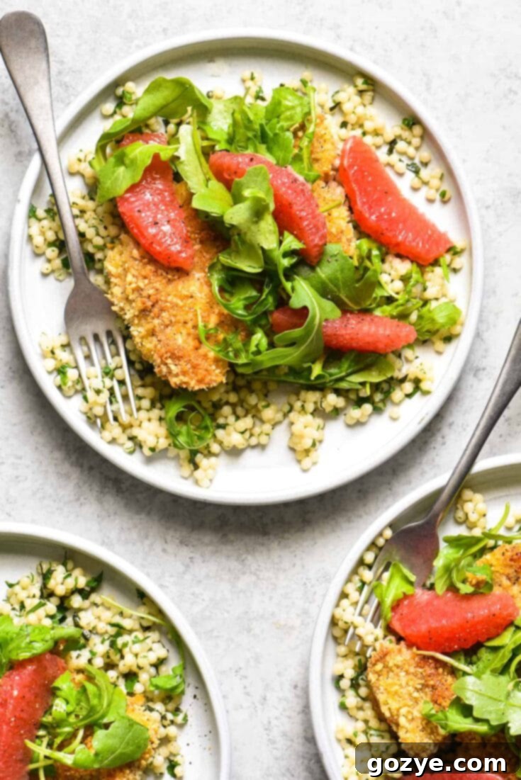 Almond Crusted Chicken with couscous and grapefruit arugula salad